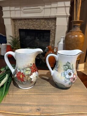 Set of Vintage Sarica floral pitchers. 8”T x 6”W.